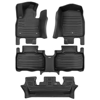 A set of black TuxMat car floor mats for Ford Explorer 7-Seater models.